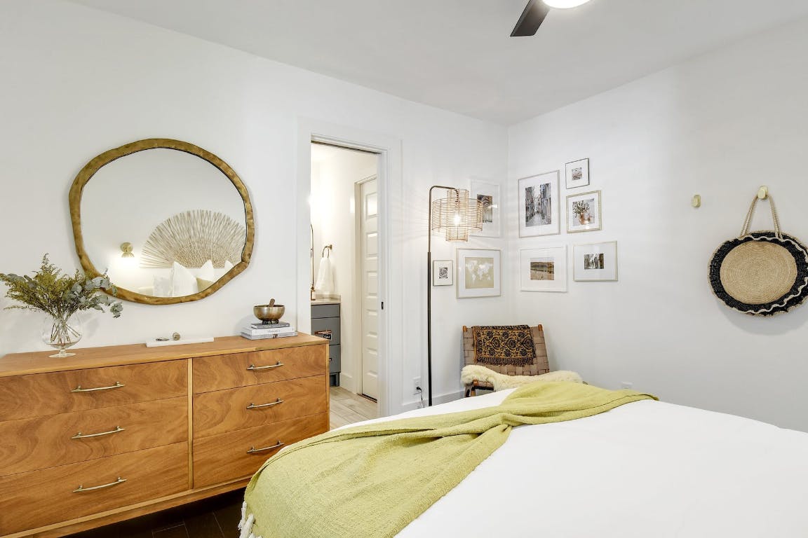 2901 Glen Rae Street, Unit A Austin, TX 78702 - Photo 17 of 36 a bedroom with a bed and a dresser