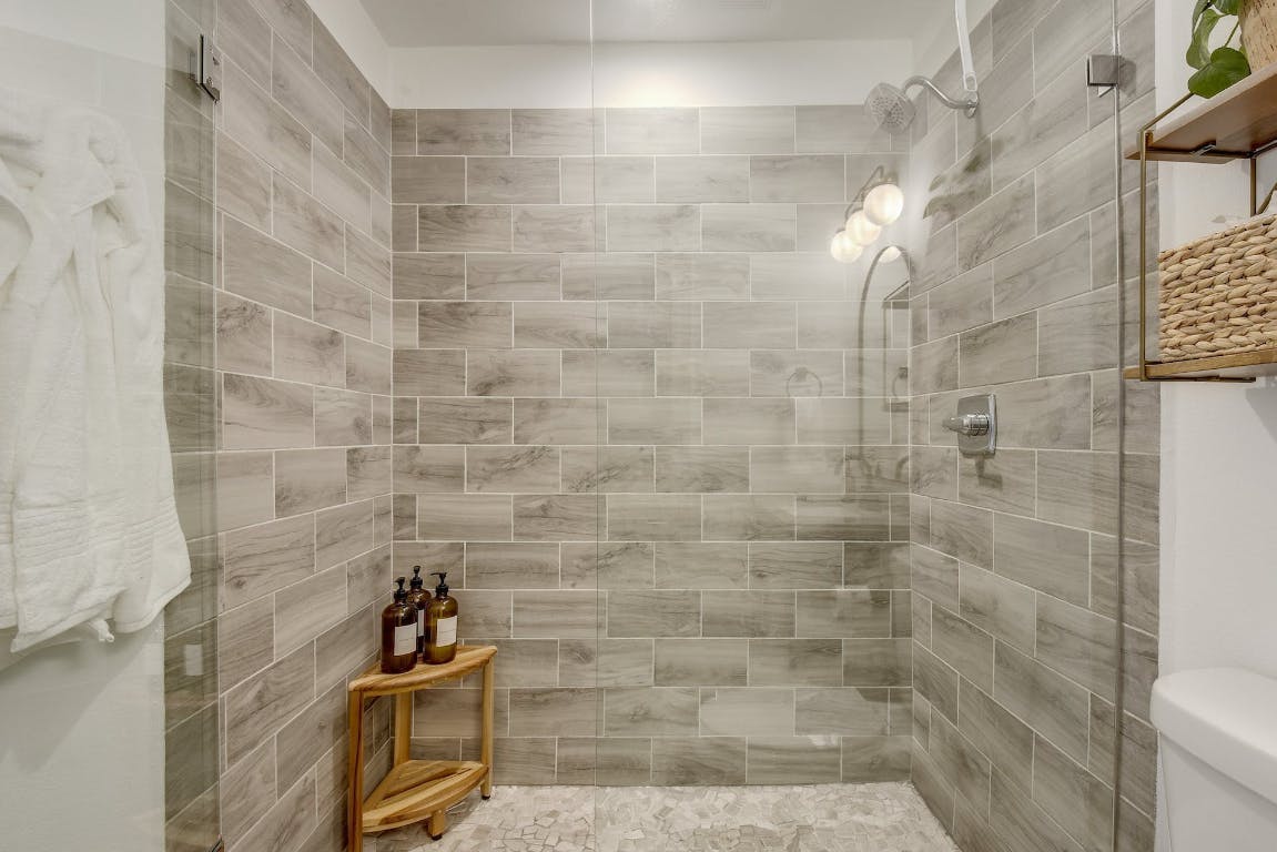 2901 Glen Rae Street, Unit A Austin, TX 78702 - Photo 20 of 36 a bathroom with a shower