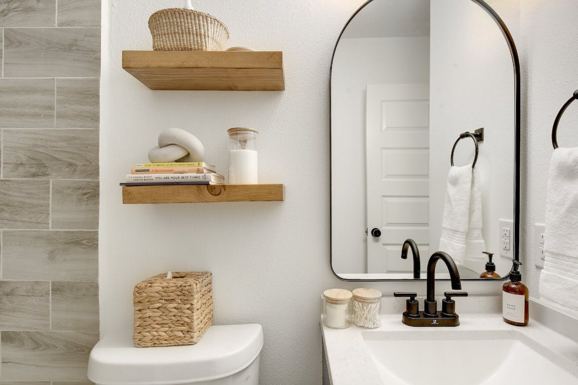 2901 Glen Rae Street, Unit A Austin, TX 78702 - Photo 29 of 36 a bathroom with a sink and a mirror