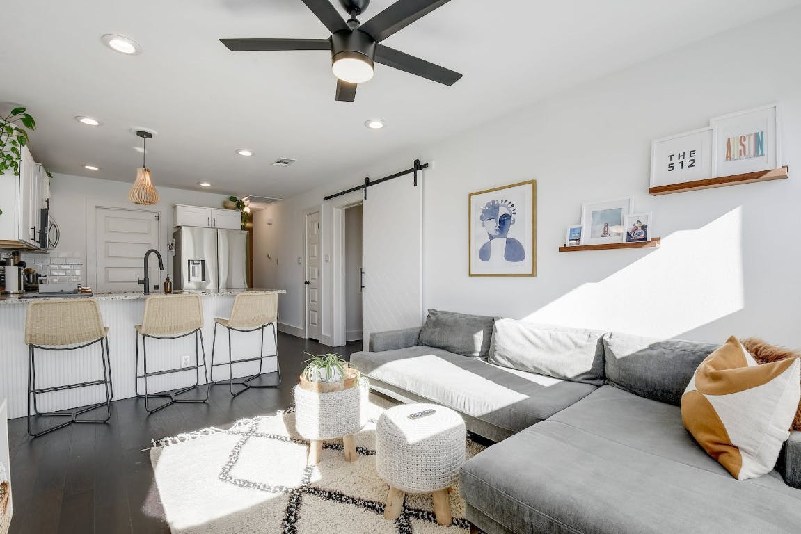 2901 Glen Rae Street, Unit A Austin, TX 78702 - Photo 5 of 36 a living room with furniture and a view of kitchen