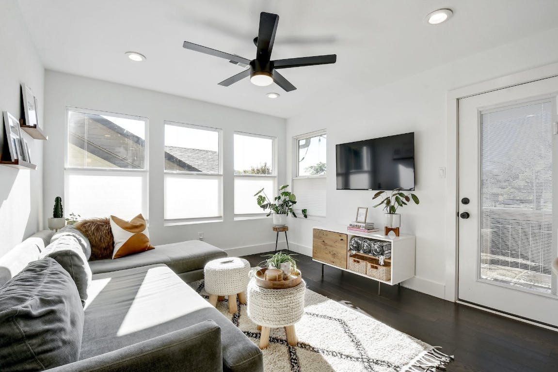 2901 Glen Rae Street, Unit A Austin, TX 78702 - Photo 7 of 36 a living room with furniture and a flat screen tv