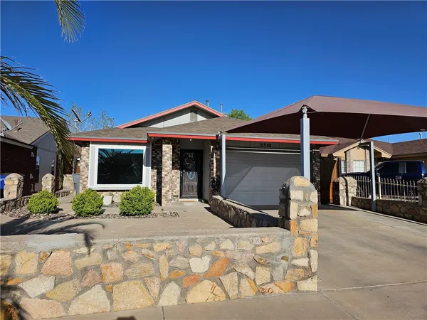 a front view of a house with patio