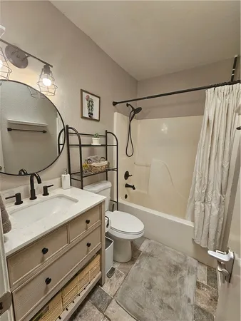 a view of a car park in front of house