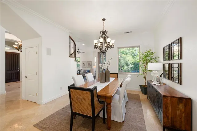 a en suite bathroom with a double vanity sink and a mirror