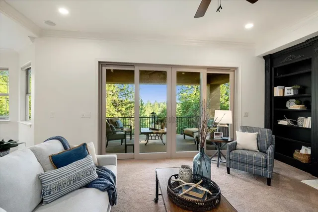 a view of a chairs and table in patio