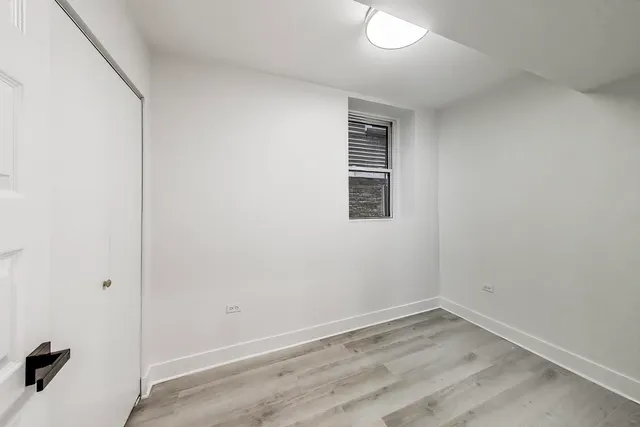 a view of a room that has a window in it