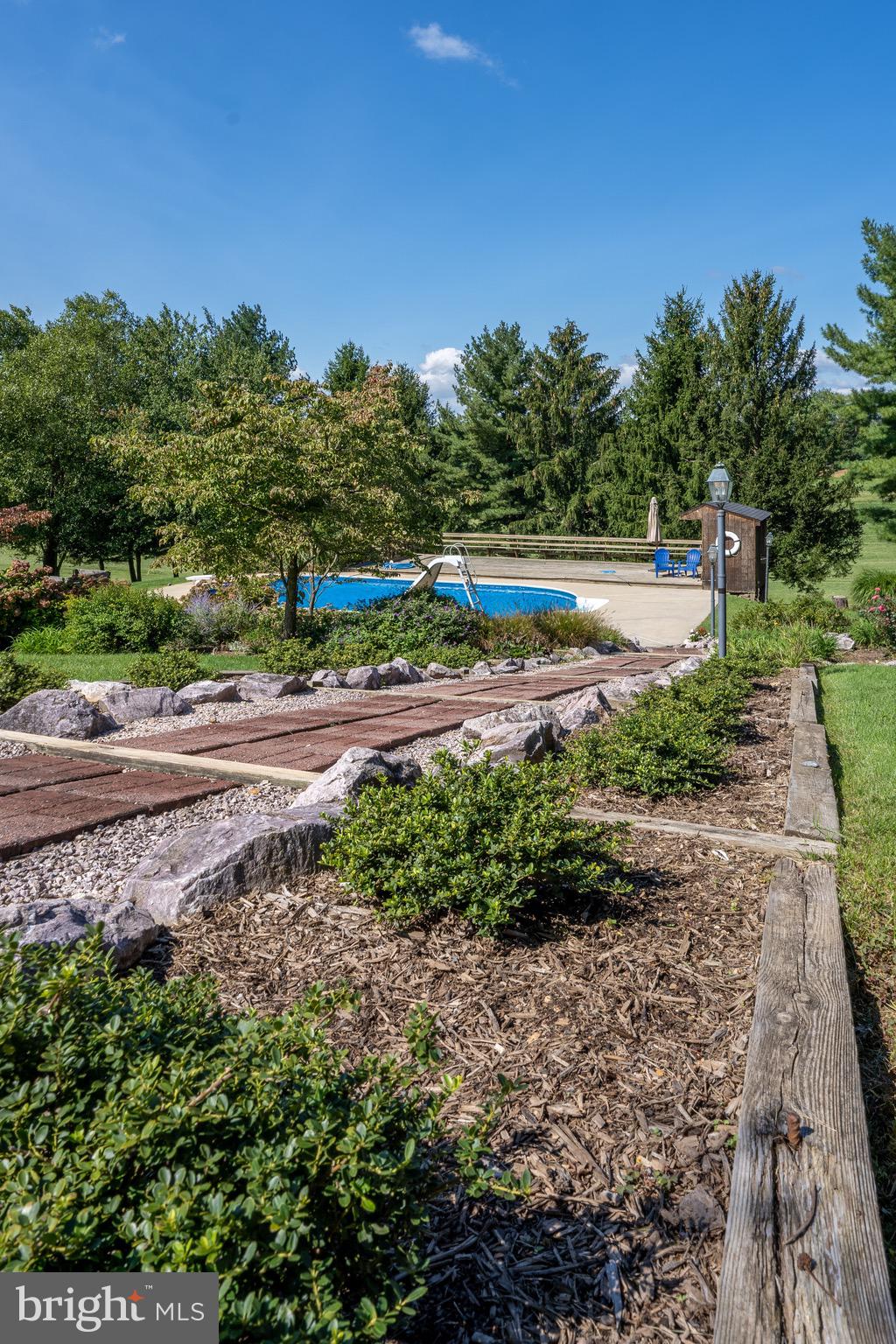 27720 Ridge Road Damascus, MD 20872 - Photo 50 of 90 Lovely path to the private pool