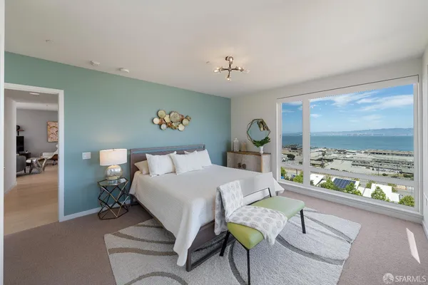 a bed room with a bed and a table