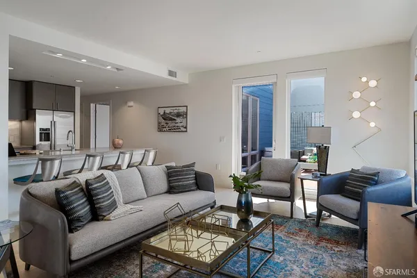 a living room with furniture and a couch