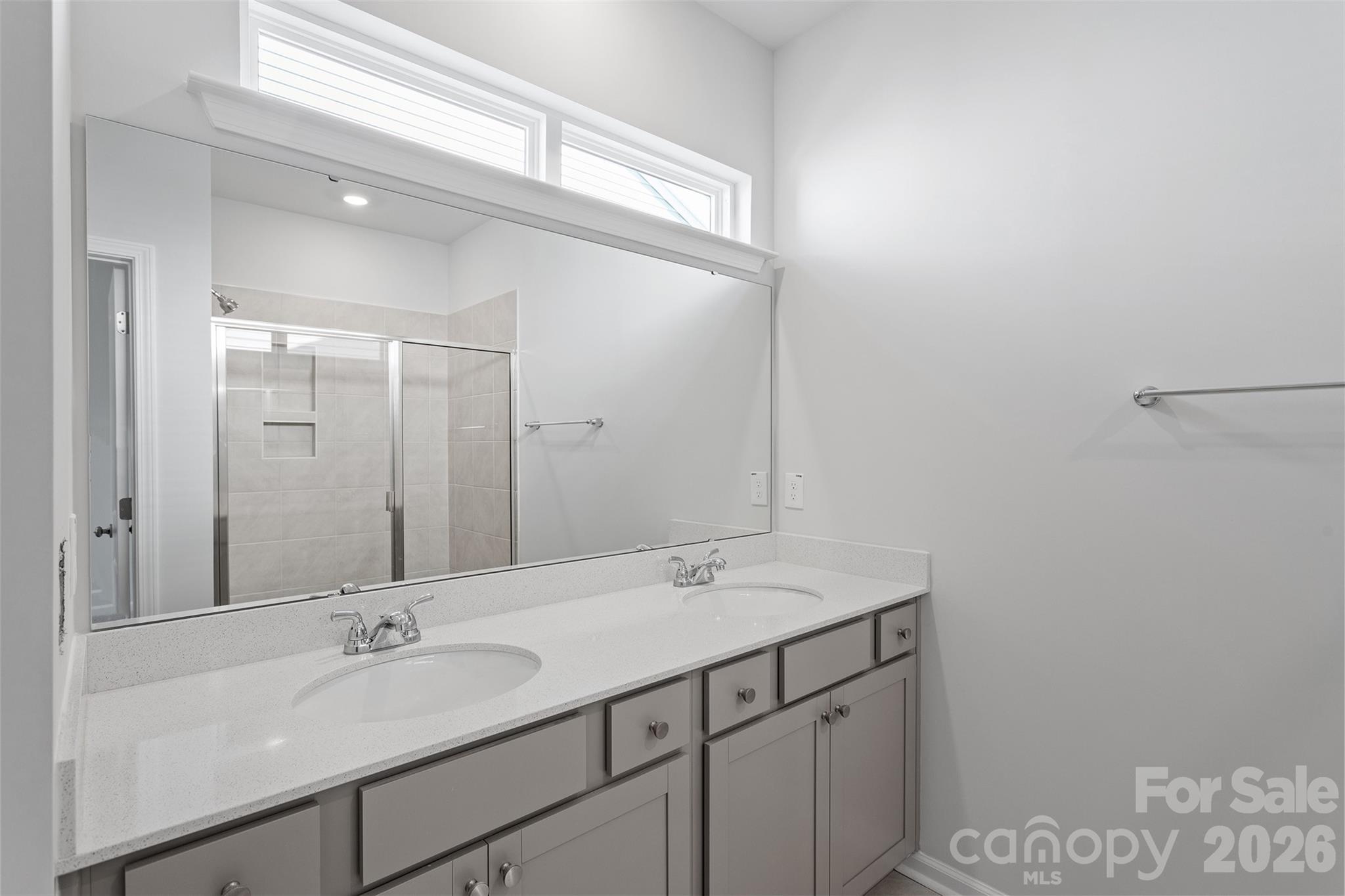 5865 Tuckaseegee Road, Unit 2 Charlotte, NC 28208 - Photo 18 of 26 a bathroom with a sink and a mirror