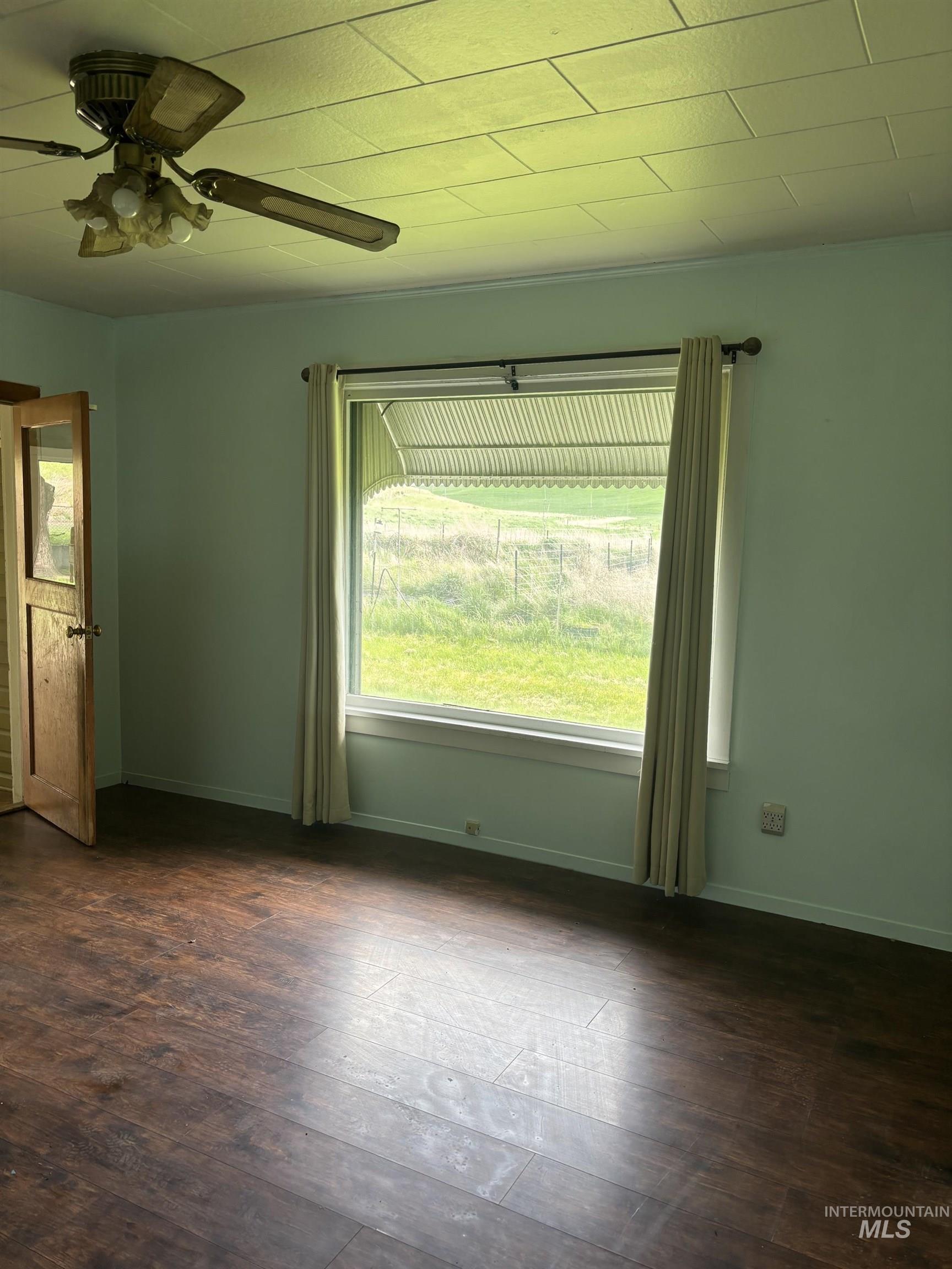 845 Malone Hill Road Pomeroy, WA 99347 - Photo 20 of 30 Spacious interior with dark wood-finish flooring