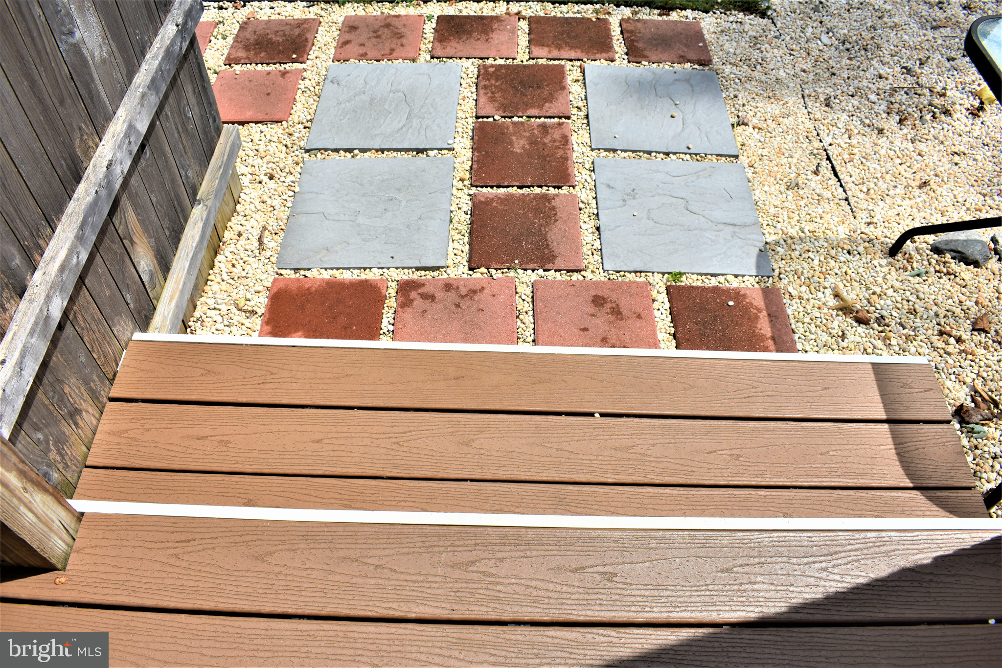 300 Village Road Wilmington, DE 19805 - Photo 31 of 39 Vinyl Steps/ Paver Walk Way W/ Stones