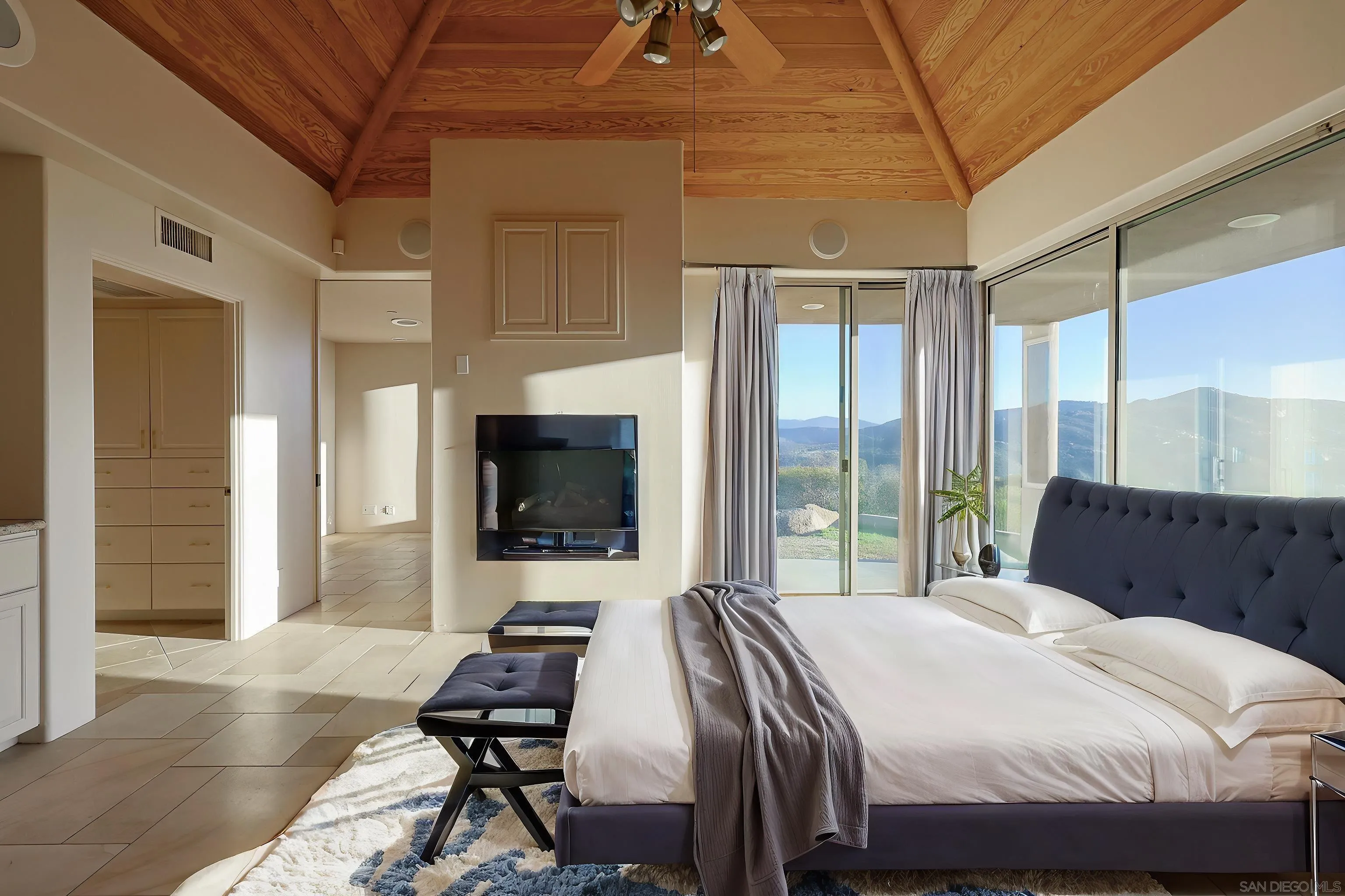 15740 Broad Oaks Road El Cajon, CA 92021 - Photo 17 of 47 a bedroom with a bed and a flat screen tv