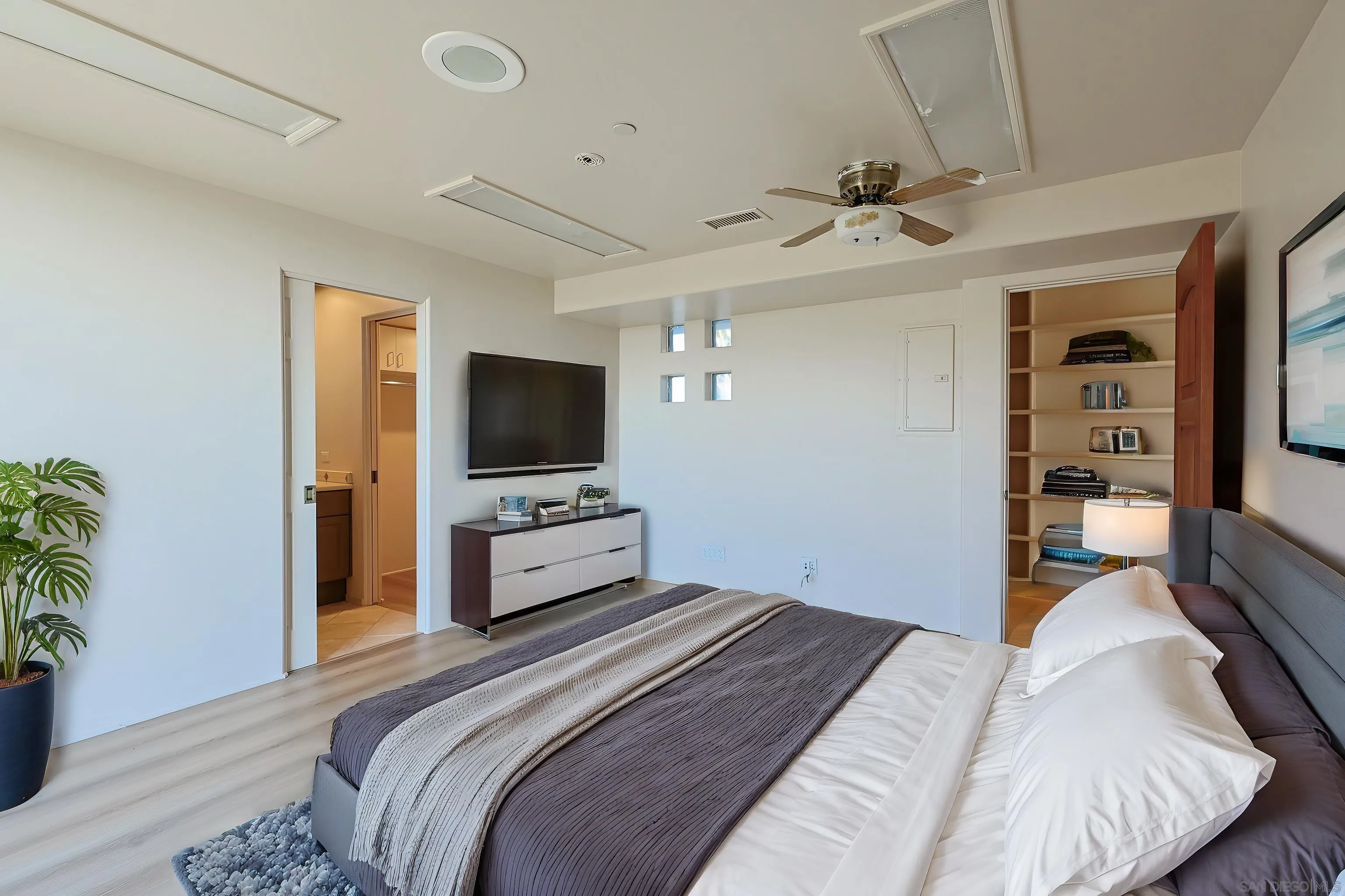 15740 Broad Oaks Road El Cajon, CA 92021 - Photo 23 of 47 a bedroom with a bed and a flat screen tv