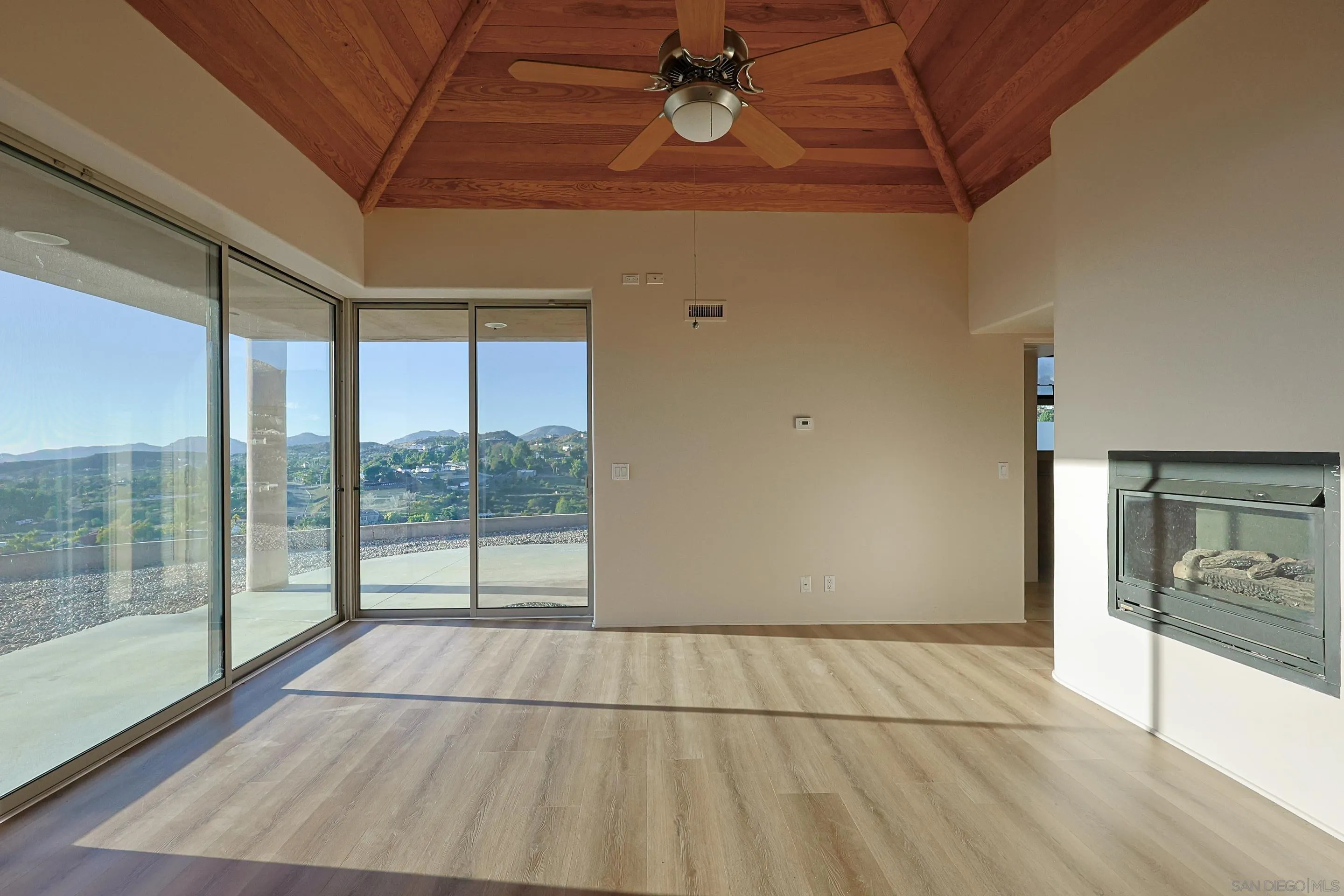 15740 Broad Oaks Road El Cajon, CA 92021 - Photo 27 of 47 a view of an empty room with a window