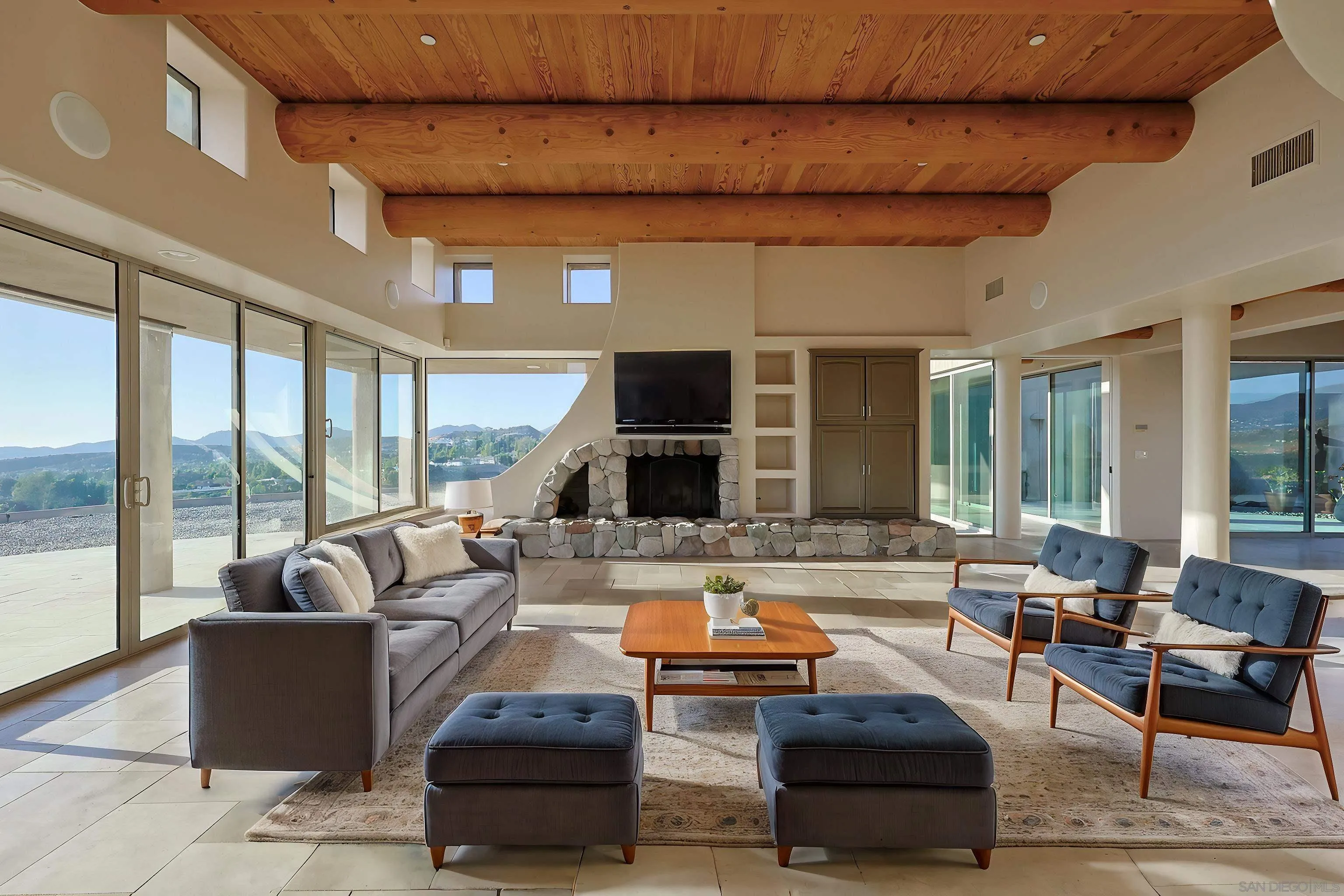 15740 Broad Oaks Road El Cajon, CA 92021 - Photo 8 of 47 a living room with furniture and a flat screen tv