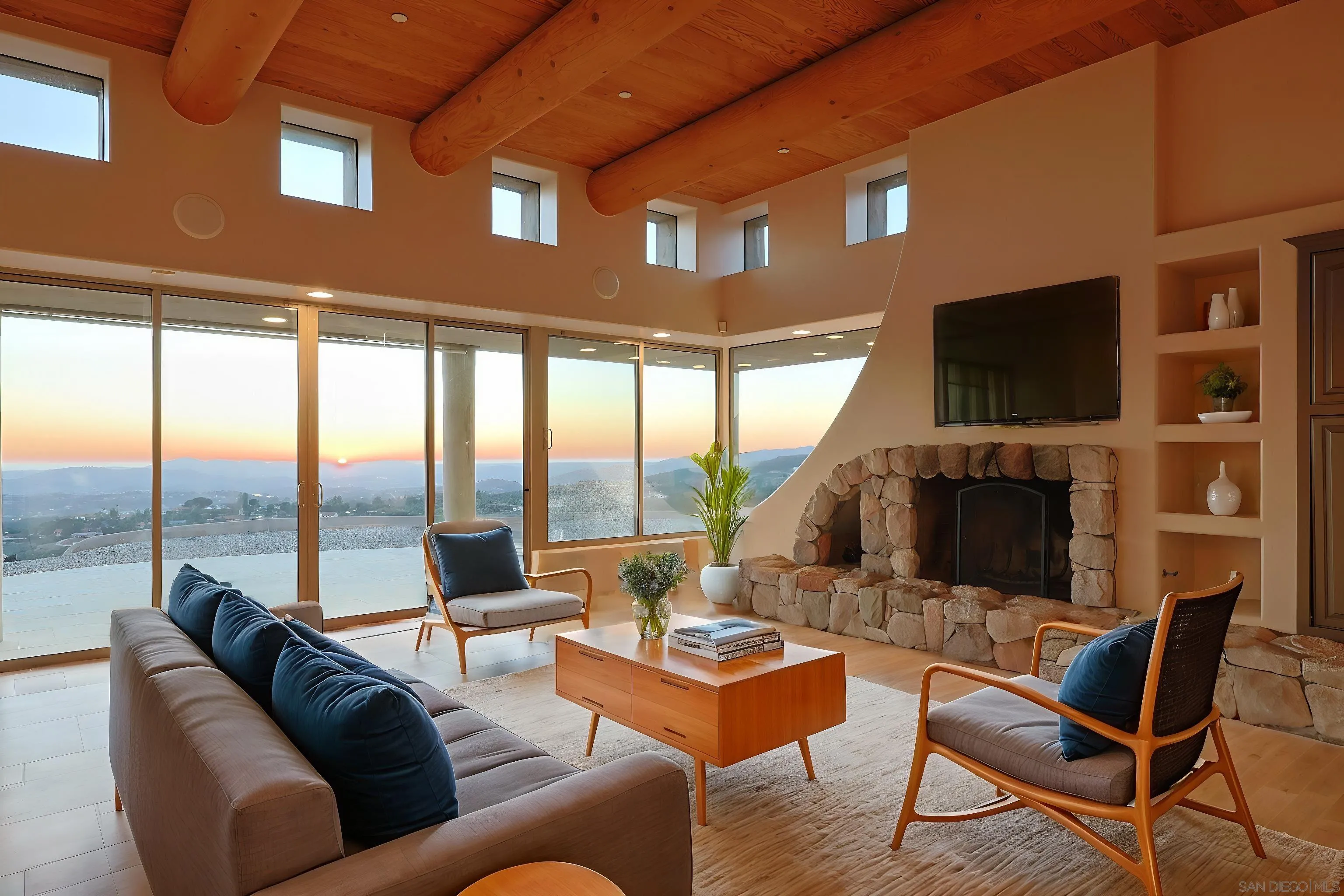 15740 Broad Oaks Road El Cajon, CA 92021 - Photo 9 of 47 a living room with fireplace furniture and a flat screen tv