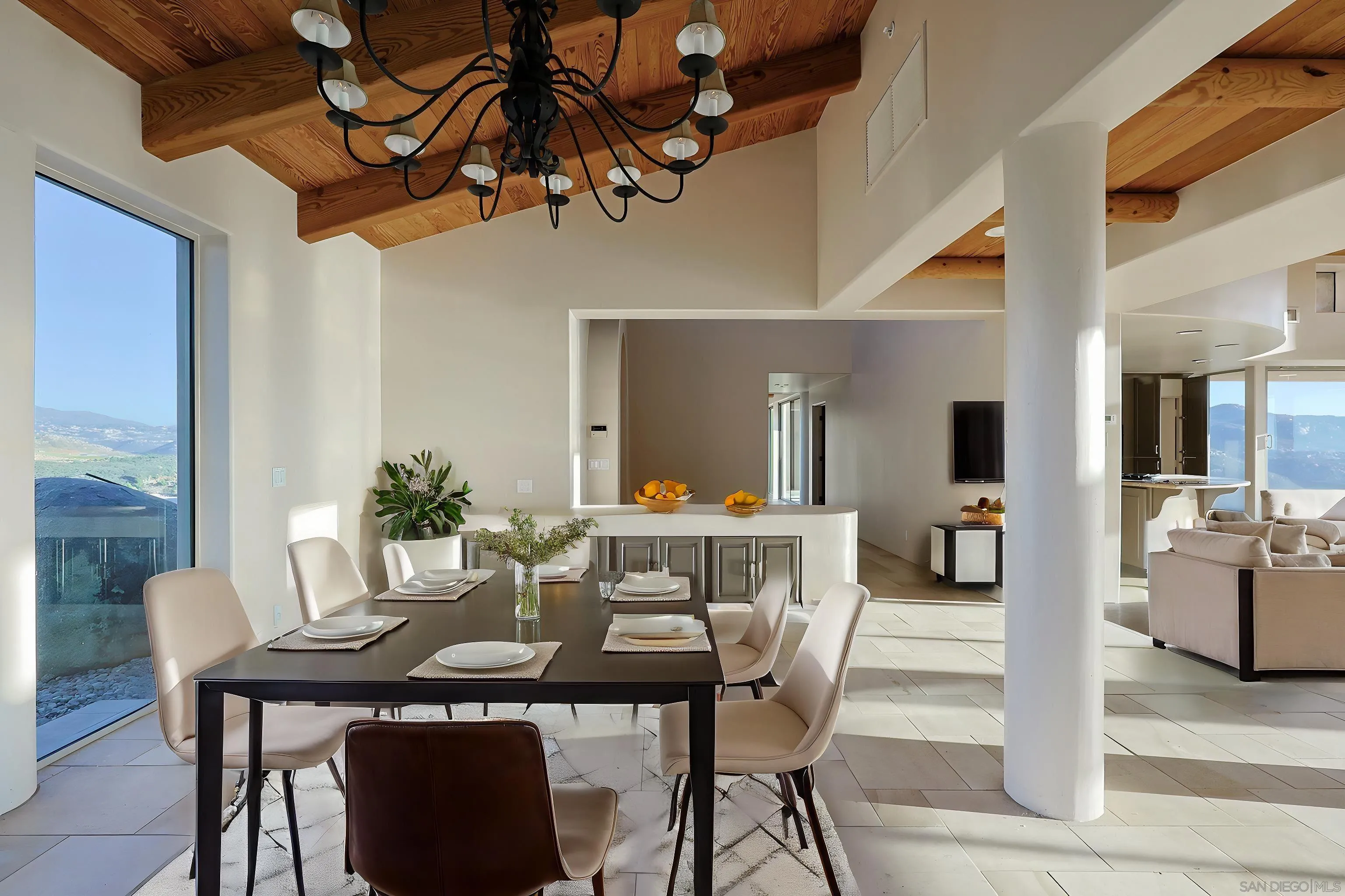 15740 Broad Oaks Road El Cajon, CA 92021 - Photo 10 of 47 a dining room with furniture potted plants and wooden floor