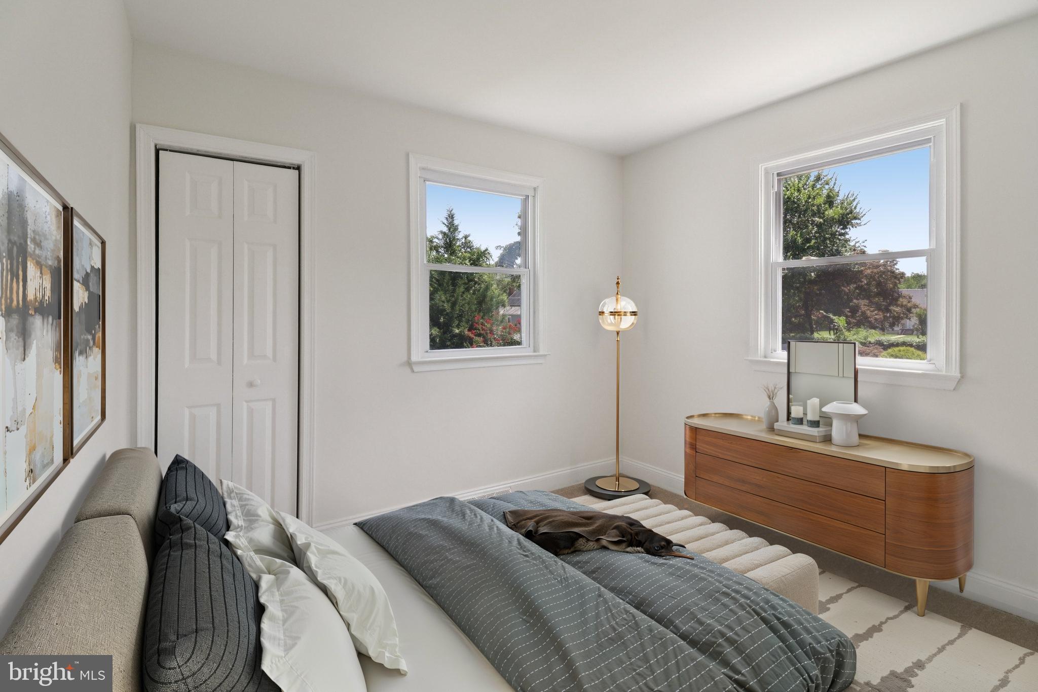 4604 Morgan Road Suitland, MD 20746 - Photo 15 of 38 a bedroom with a bed and a window