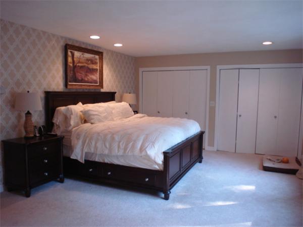 12 Red Barn Road Wayland, MA 01778 - Photo 10 of 16 a spacious bedroom with a bed and a closet