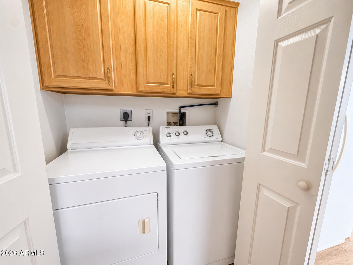 201 South Greenfield Road, Unit 11 Mesa, AZ 85206 - Photo 16 of 22 a utility room with dryer and washer