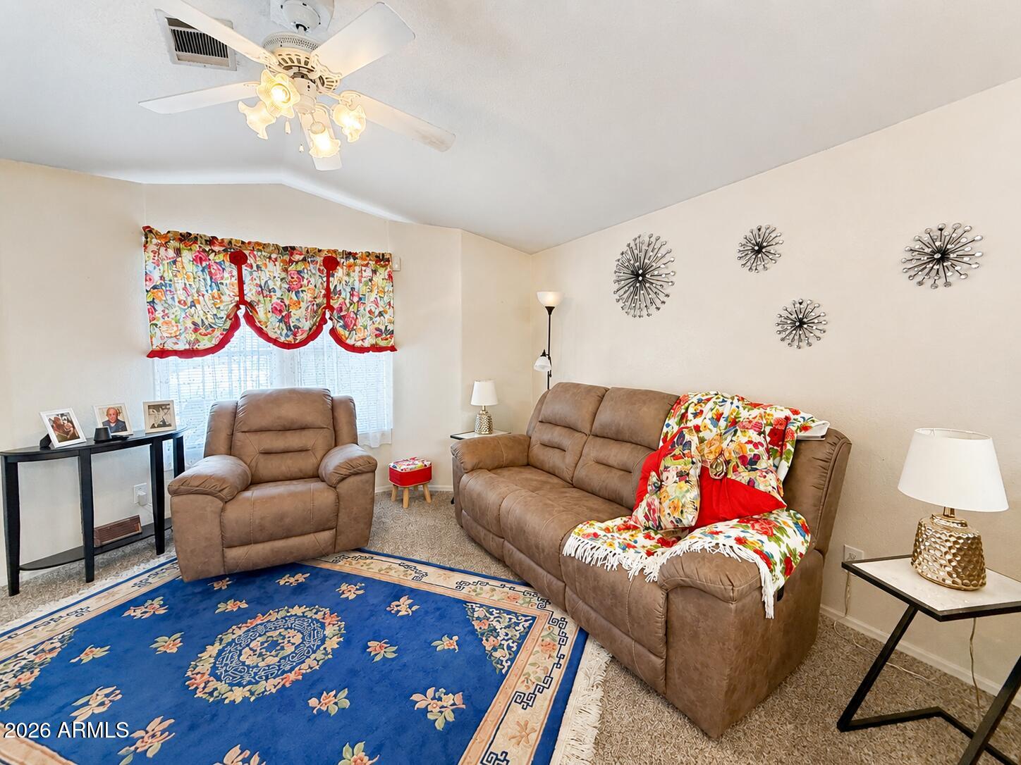 201 South Greenfield Road, Unit 11 Mesa, AZ 85206 - Photo 6 of 22 a living room with furniture and a rug