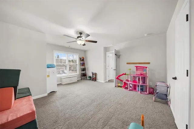 a balcony with furniture and wooden floor