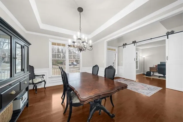 a kitchen with stainless steel appliances kitchen island a stove and a refrigerator