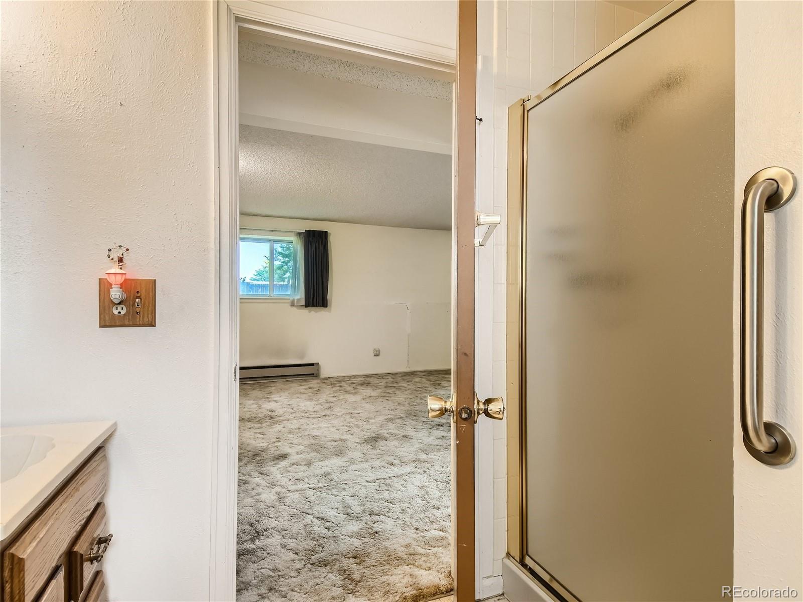 11090 Eudora Way Thornton, CO 80233 - Photo 16 of 28 a view of a bathroom
