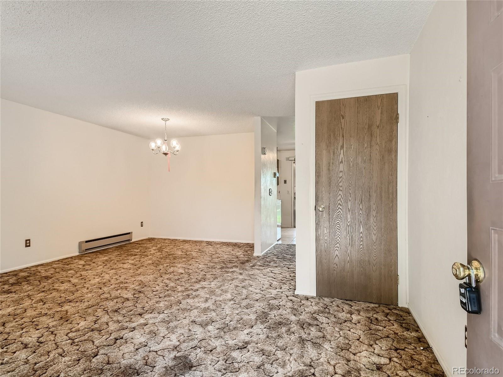 11090 Eudora Way Thornton, CO 80233 - Photo 4 of 28 a view of an empty room