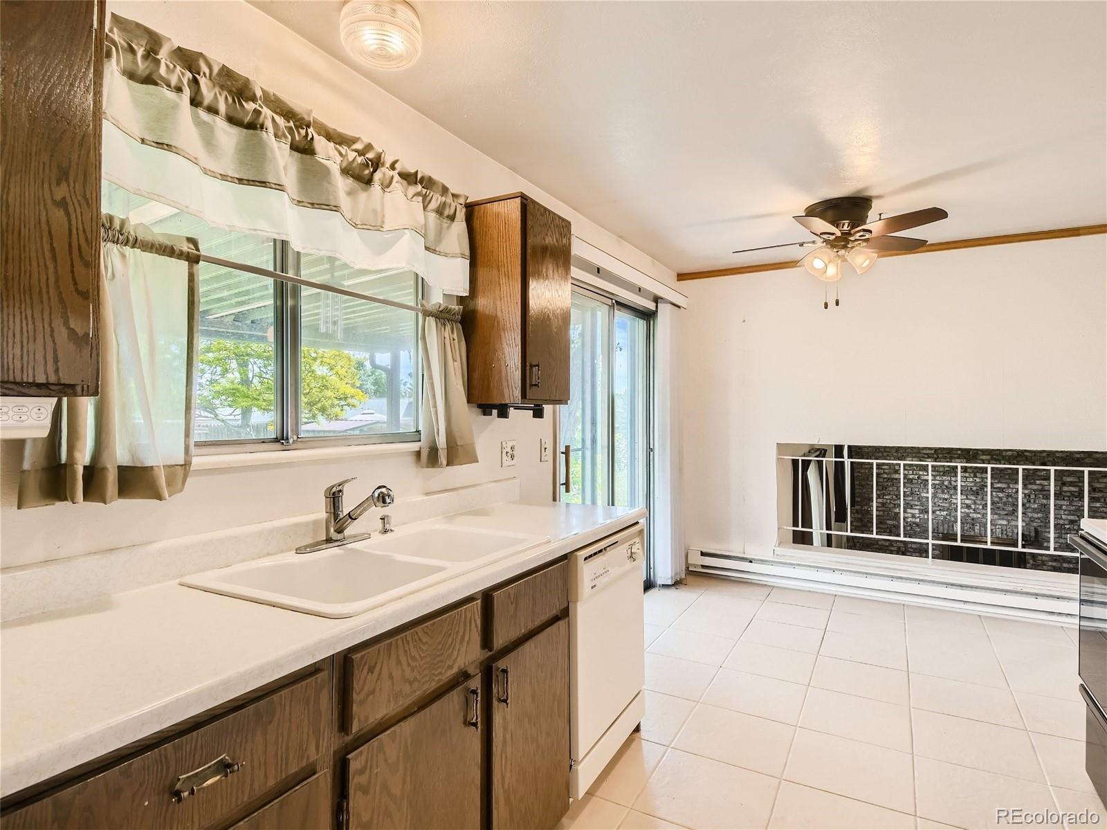 11090 Eudora Way Thornton, CO 80233 - Photo 10 of 28 a bathroom with a sink and a mirror