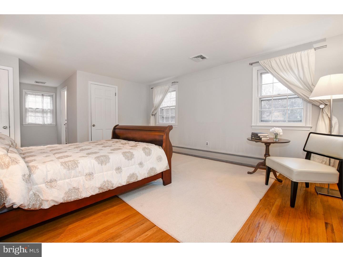 751 Mancill Road Wayne, PA 19087 - Photo 17 of 20 a bedroom with a bed and a window