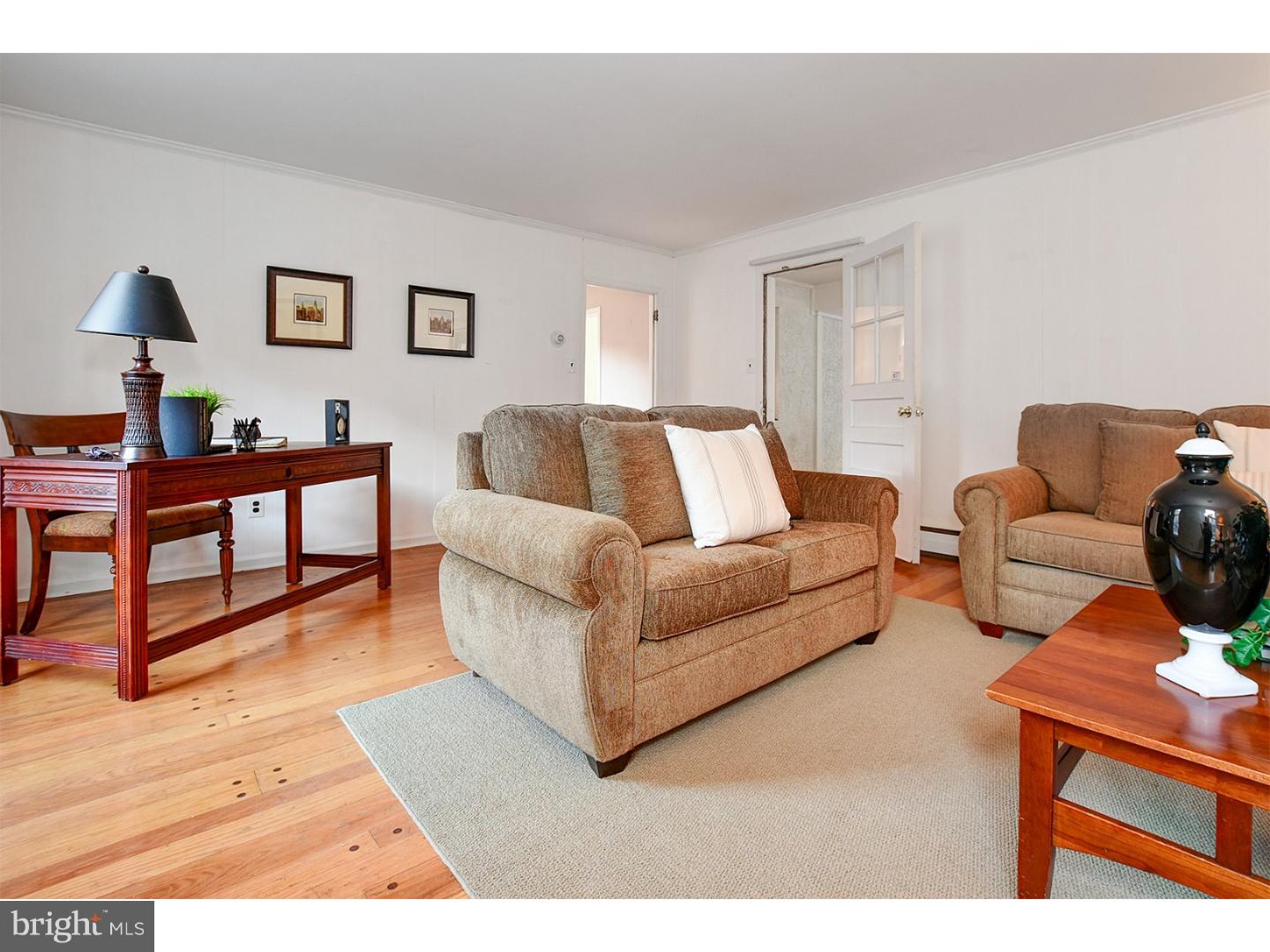 751 Mancill Road Wayne, PA 19087 - Photo 6 of 20 a living room with furniture and a wooden floor