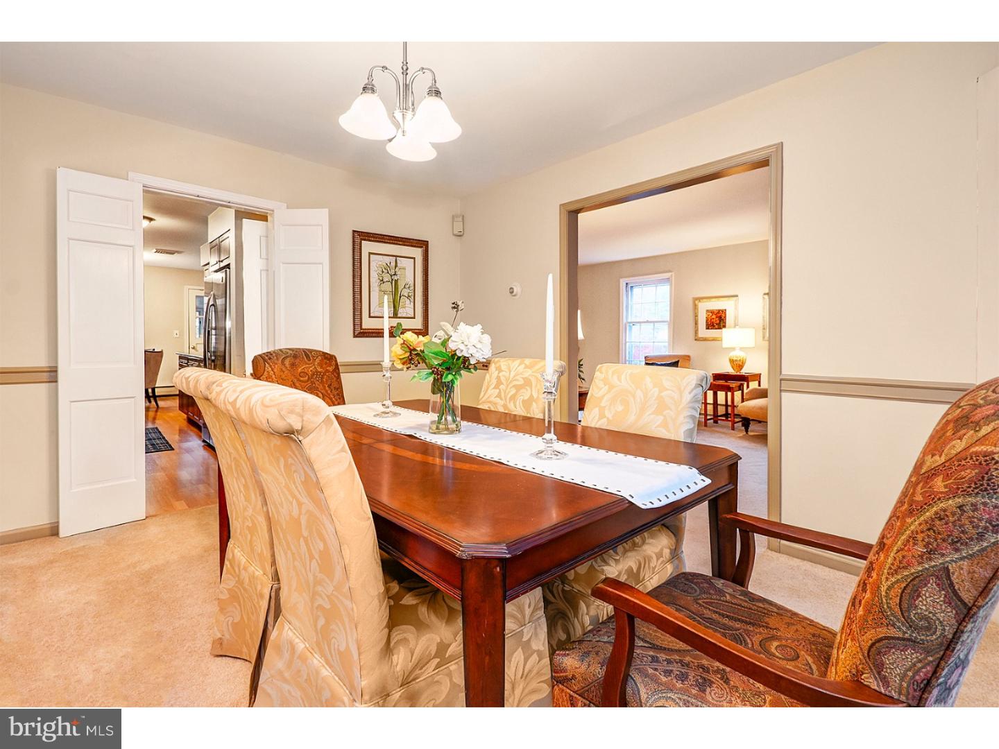 751 Mancill Road Wayne, PA 19087 - Photo 9 of 20 a view of a dining room with furniture and wooden floor