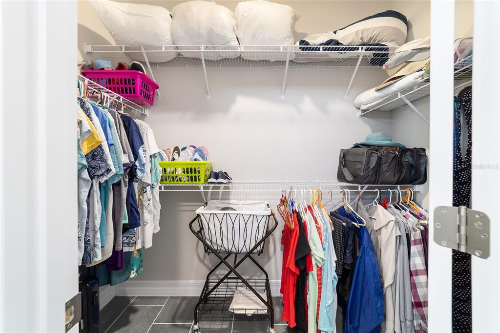 4838 Southwest 130th Street Ocala, FL 34473 - Photo 25 of 48 a view of walk in closet with clothes and shoes