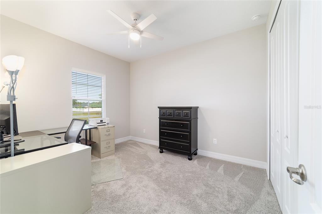 4838 Southwest 130th Street Ocala, FL 34473 - Photo 29 of 48 a view of an empty room with a window