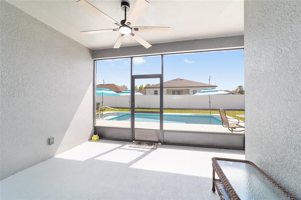 4838 Southwest 130th Street Ocala, FL 34473 - Photo 35 of 48 a view of a glass door with a balcony