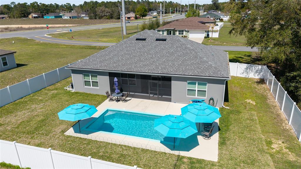 4838 Southwest 130th Street Ocala, FL 34473 - Photo 48 of 48 a view of a house with a swimming pool