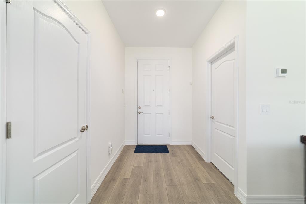 4838 Southwest 130th Street Ocala, FL 34473 - Photo 6 of 48 a view of a room with wooden floor