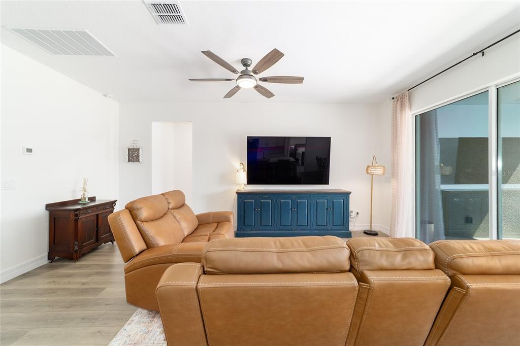4838 Southwest 130th Street Ocala, FL 34473 - Photo 9 of 48 a living room with furniture and a window