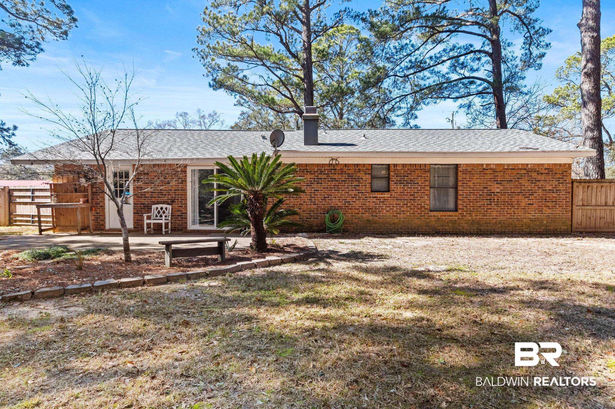 5366 Scanlan Way West Satsuma, AL 36572 - Photo 31 of 43 Back of house with brick siding and a shingled roof