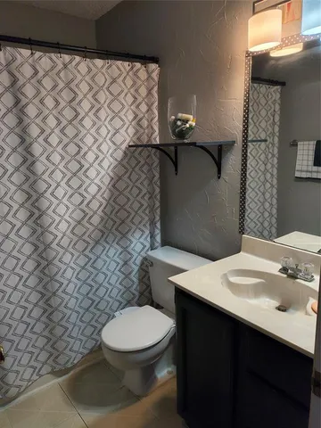 a bathroom with a sink and a toilet