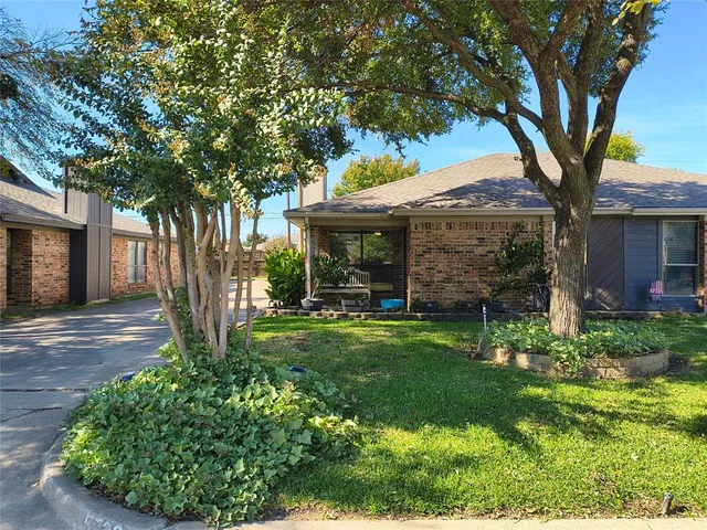 a view of a house with a garden