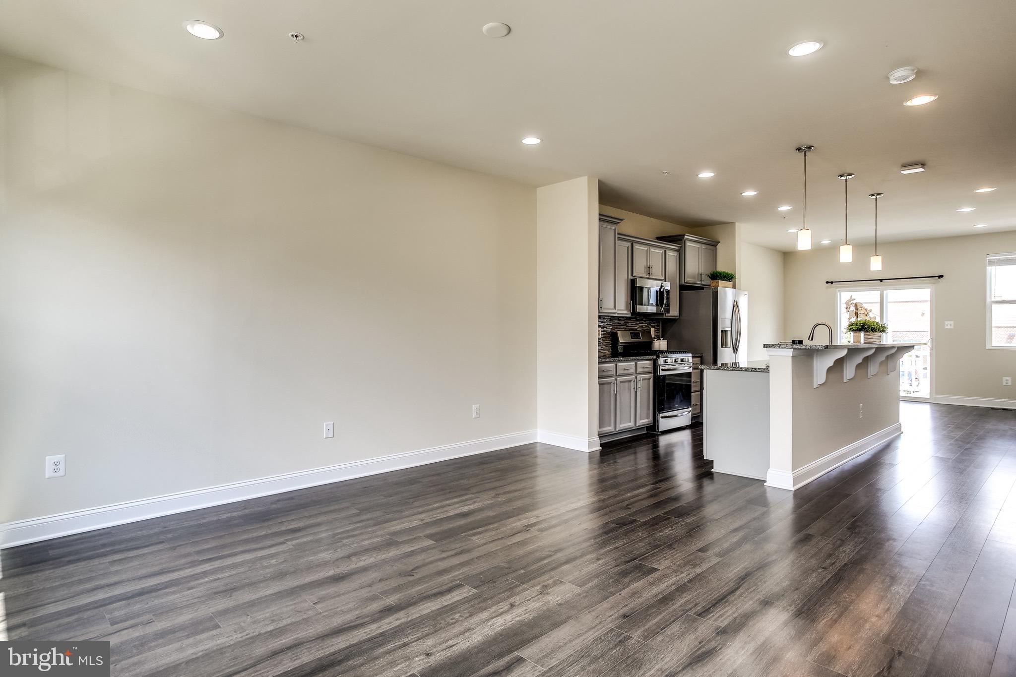 Family Area w/ Brand New Floors.