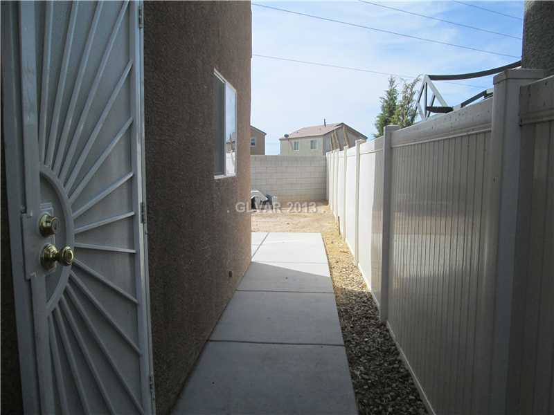 Property Photo. ONE SIDE YARD