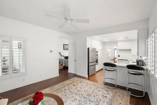 a living room with furniture window and a table