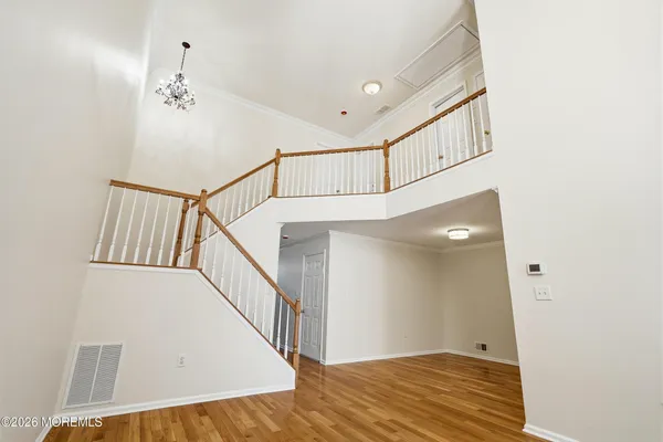 a view of house with backyard