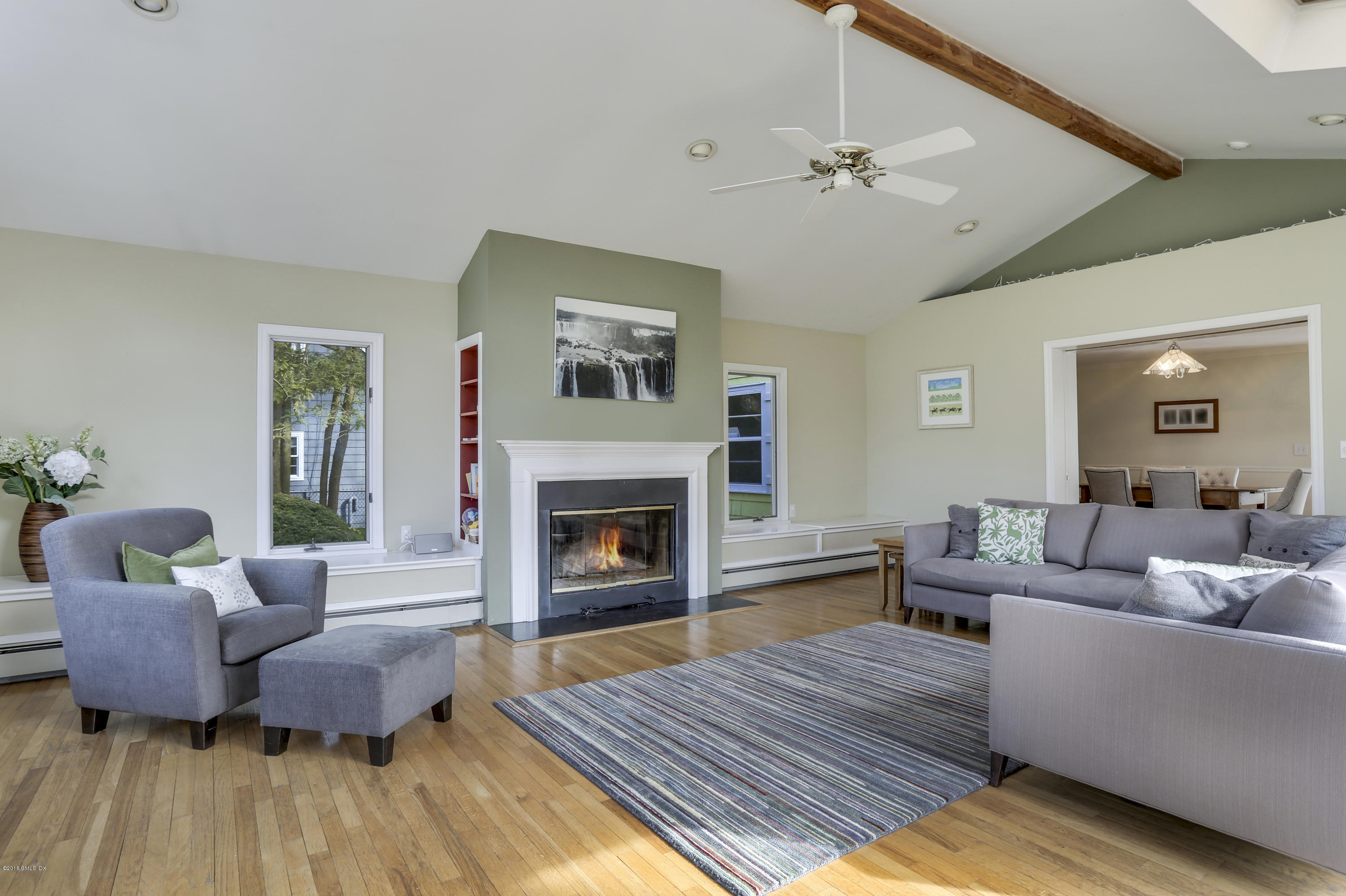 28 Indian Field Road Greenwich, CT 06830 - Photo 2 of 26 a living room with furniture and a fireplace