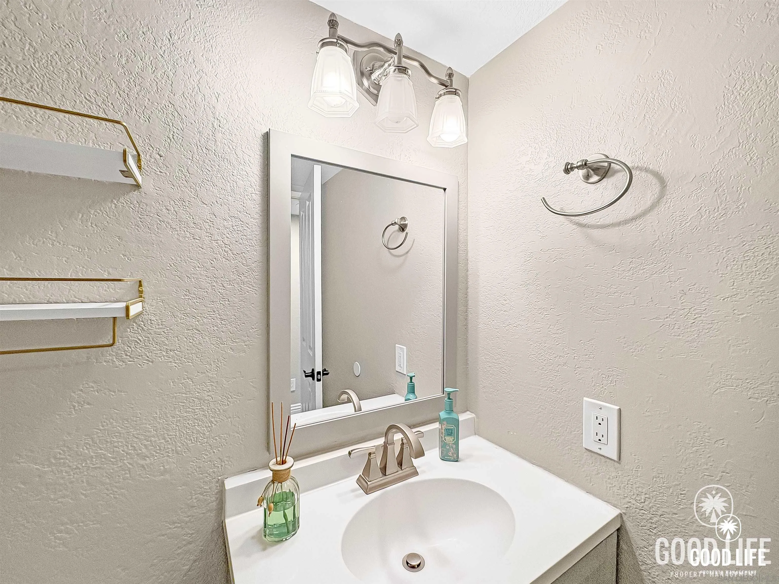 391 Via Almansa Encinitas, CA 92024 - Photo 19 of 29 a bathroom with a sink and a mirror