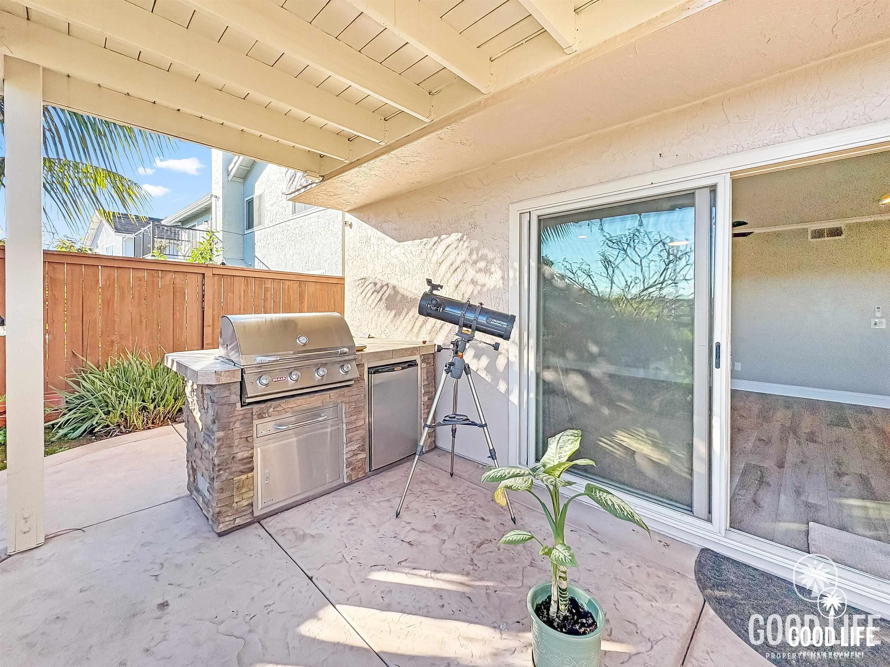 391 Via Almansa Encinitas, CA 92024 - Photo 21 of 29 a living room with granite countertop furniture and a floor to ceiling window